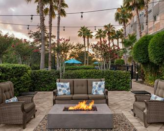 Courtyard by Marriott Orlando South/Grande Lakes Area - Orlando - Patio