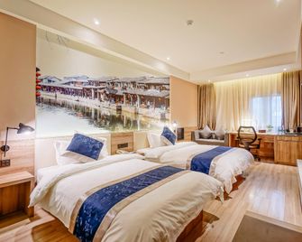 Hanting Premium Hotel Youjia Nanjing Olympic Sports Center - Nankín - Habitación