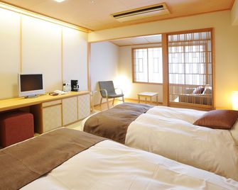 Hotel Taisetsu Onsen&Canyon Resort - Kamikawa - Bedroom