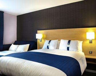 هوليداي إن اكسبرس مانشستر إيربورت - مانشستر - غرفة نوم