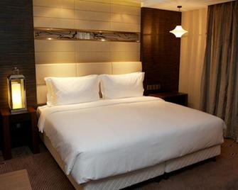 Double Bay Hotel Qingdao - تشينغداو - غرفة نوم