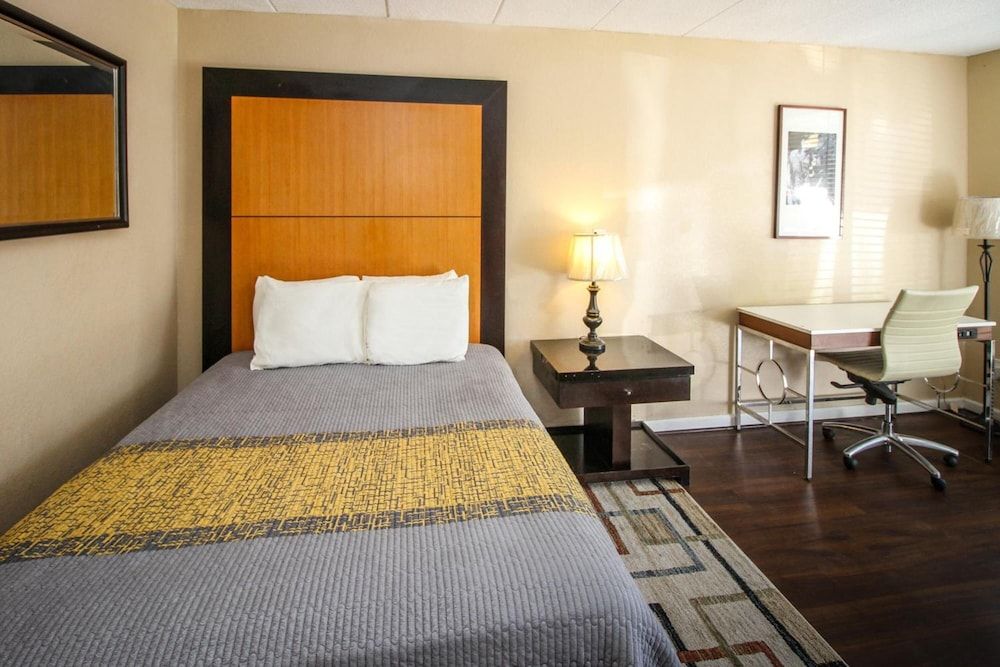 Bedroom view of APM Inn & Suites