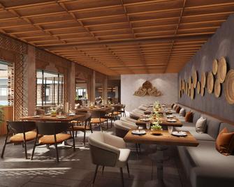 Hilton Hyderabad Genome Valley Resort & Spa - Hyderabad - Restaurante