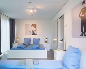 Lu Titlis I - Allmend Hitrental Apartment - Luzern - Schlafzimmer