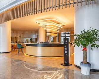 Rezen Kingtown Hotel - Wanning - Lobby