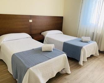 A Casa do Lareiro - A Lanzada - Camera da letto