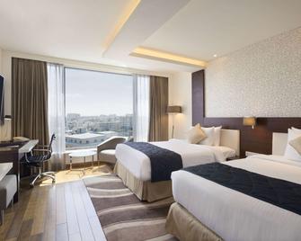 Howard Johnson by Wyndham Bengaluru Hebbal - באנגאלור - חדר שינה