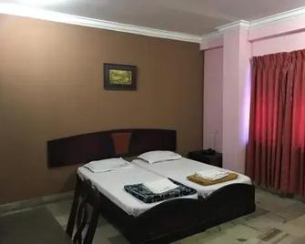 Indraprastham Tourist Home - Kottayam - Bedroom