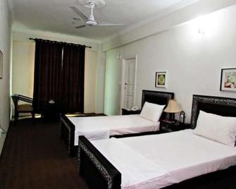 Stargaze Hotel & Apartment - Abbottabad - Habitación