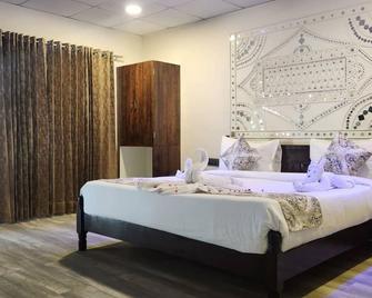 Sapphero Jungle Vista Resort - Sasan Gir - Sasan Gir - Bedroom