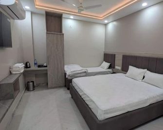 Haritwal Guest House - Varanasi - Κρεβατοκάμαρα