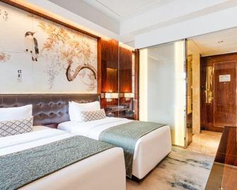 Celebrity Deyang Hotel - Deyang - Habitación