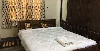 Dea Service Apartment - Tirupati - Bedroom