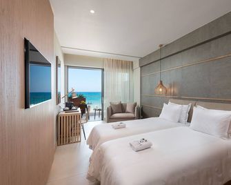 Ikones Seafront Luxury Suites - ריתימנו - חדר שינה