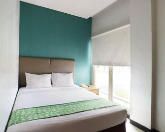 RedDoorz Plus at Blue Pacific Blok M - Jakarta - Bedroom