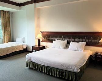 Royal Mekong Riverside Hotel - Nong Khai - Schlafzimmer