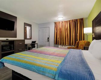 Monsoon Inn - Beaumont - Makuuhuone