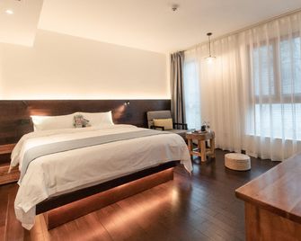 Chengdu Jiansu Homestay - Chengdu - Bedroom