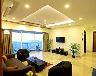 Nirvana Residences by 1589 Hotels - Mumbai - Living room