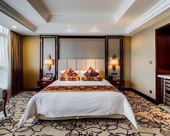 Soluxe Hotel Guangzhou - Kanton - Slaapkamer
