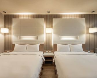 Kindness Hotel Hualien - Hualien City - Schlafzimmer