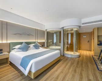 Xinyue Hotel - Weifang - Camera da letto