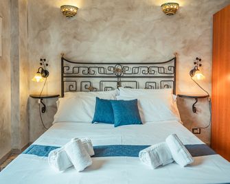 B&B Marranzano - ג'יארדיני נאקסוס - חדר שינה