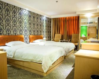 Fuhao Hotel - Guangzhou - Schlafzimmer