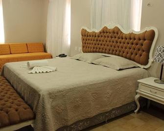 Seringal Hotel - מאנואס - חדר שינה