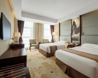 Beris Media Hotel - Qingdao - Bedroom