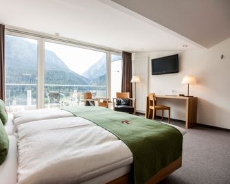 Engadiner Boutique-Hotel GuardaVal - Scuol - Habitación