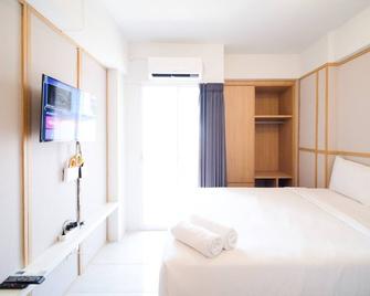 Simple And Tidy Studio Apartment At Suncity Residence - Surabaya - Soverom