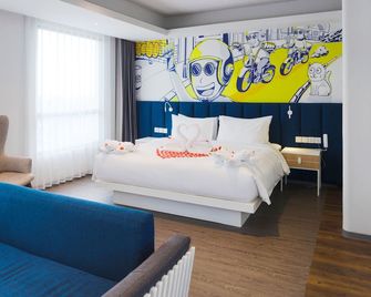 Yello Hotel Jambi - Jambi - Schlafzimmer