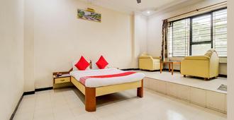 Hotel Sri Jai Palace - Nashik - Bedroom