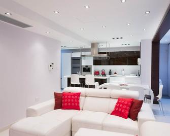 Instyle Aparthotel - San Julián - Sala de estar