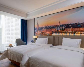 Vienna International Hotel - Kunming - Habitación