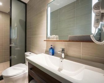 Hanting Hotel Dalian Development Zone Jinma Road - Dalian - Bedroom