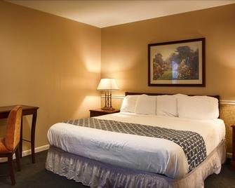 Alpine Inn & Suites Rockford - Rockford - Bedroom