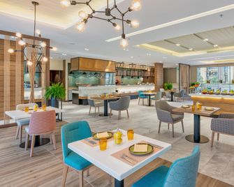Holiday Inn & Suites Al Jubail - Al Jubail - Restaurace