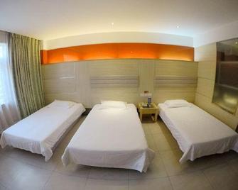 Yun 7 Hotel (Yichang Cbd Shopping Center Three Gorges Electric Power Vocational College Branch) - Yichang - Habitación