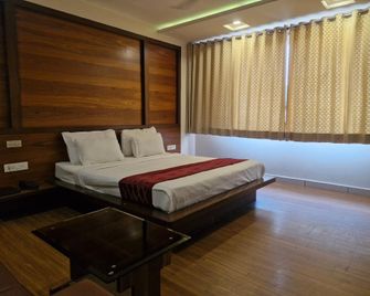Hotel Radiant Kolhapur - Kolhāpur - Κρεβατοκάμαρα