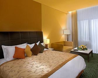 Golden Flower By Kagum Hotels - Bandung - Bedroom