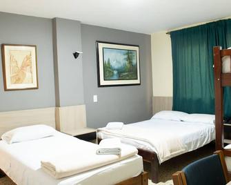 Hotel Caldas Plaza - Caldas - Habitación