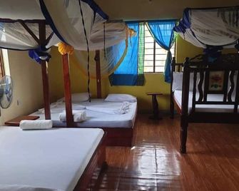 House perfect for families and groups - Bwejuu - Chambre