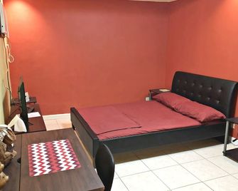 كالايان ترانسينت هاوس - إموس - غرفة نوم