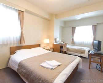 Kishibe Station Hotel - Suita - Bedroom
