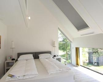 Duinhuis 11 modern holiday villa right at the North Sea dunes - Noordwelle - Habitación