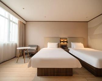 Hanting Hotel (Baolong Plaza, Suqian) - Suqian - Bedroom