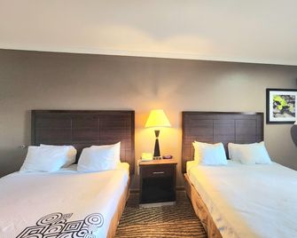 Days Inn by Wyndham Navasota - Navasota - Bedroom