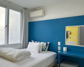 Slow Citi Guest House - סאוגוויפו - חדר שינה